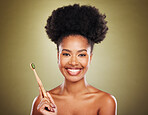 Wooden toothbrush, black woman and portrait for eco friendly self care, beauty or cosmetics with smile. Model, woman and african for dental, healthcare or organic teeth whitening by studio background