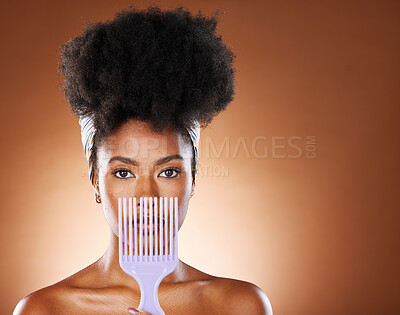 Buy stock photo Black woman, hair care beauty or model with afro comb in brown studio background portrait. Health salon, wellness or African American girl and face with natural curly hair and mockup with brush