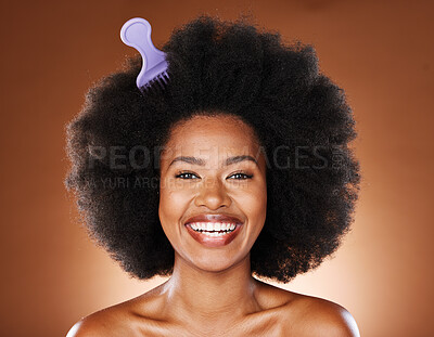 Buy stock photo Black woman. hair care and comb in afro, happy face and skincare with smile, beauty or glow in brown studio background. Cosmetic and skin health of wellness model, happiness or content face with joy 