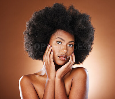 Buy stock photo Black woman, face and hair care, skincare and wellness with afro, makeup and portrait in brown studio background. Girl model, beauty and natural cosmetics, self love and beautiful  facial wellness