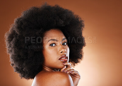 Buy stock photo Beauty, natural hair and black woman with afro in natural cosmetics portrait, makeup advertising against studio background. Skincare, face cosmetic and hair care with glowing skin and wellness mockup