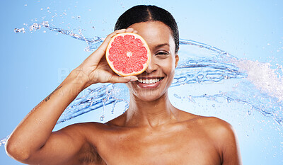 Buy stock photo Beauty, skincare and water splash with black woman and grapefruit over eye for vitamin c, luxury and spa. Shower, hydration and moisture with portrait of girl model and citrus fruit for health detox