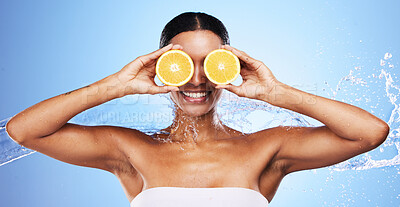 Buy stock photo Orange, skincare and woman with water splash smile about fruit, wellness and vitamin c health. Skin beauty, facial and cosmetic eye treatment of a black woman model with happiness about nutrition