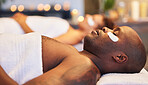 Black man, beauty facial and spa for couple wellness therapy at luxury resort for zen healing, skincare relax detox and stress release treatment. Organic, cosmetics healthcare and a natural skin glow