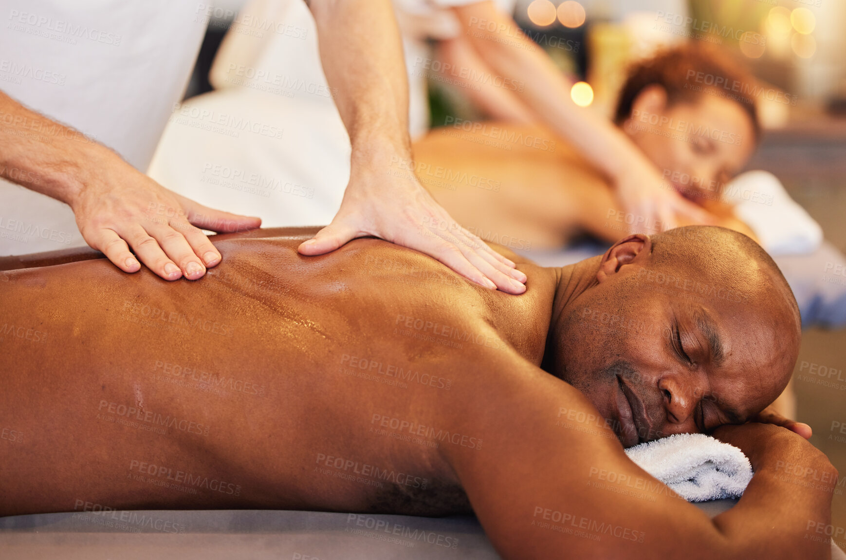 Buy stock photo Skincare, massage and physiotherapy hands for zen couple in spa for wellness, relax or health. Salon, luxury and black man and woman enjoy treatment by massage therapist on their vacation in Thailand