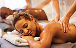 Hands, massage and relax with a couple in a spa, lying on a table for wellness or luxury at a resort. Skin, bed and therapy with a man and woman in a beauty center for zen on holiday or vacation