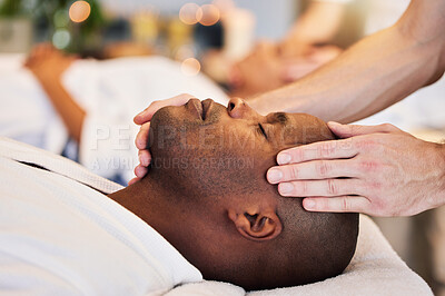 Buy stock photo Massage, sleeping and face of a black man at a spa for peace, relax and luxury service with the hands of a worker. Wellness, skincare and African person at a salon for stress relief with a masseuse