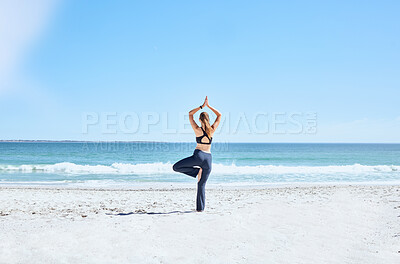 Buy stock photo Yoga, woman and at beach on sand, meditation and relax for wellness, calm and peace. Zen, female and lady with balance, exercise and pilates for training, fitness or breathing on seaside and outdoor.