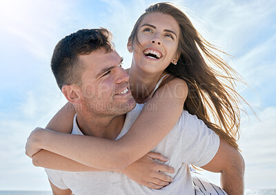 Buy stock photo Love, piggyback and happy couple at the beach on vacation while bonding together in Australia. Happiness, care and young man and woman on a seaside, ocean and summer adventure, holiday or journey.