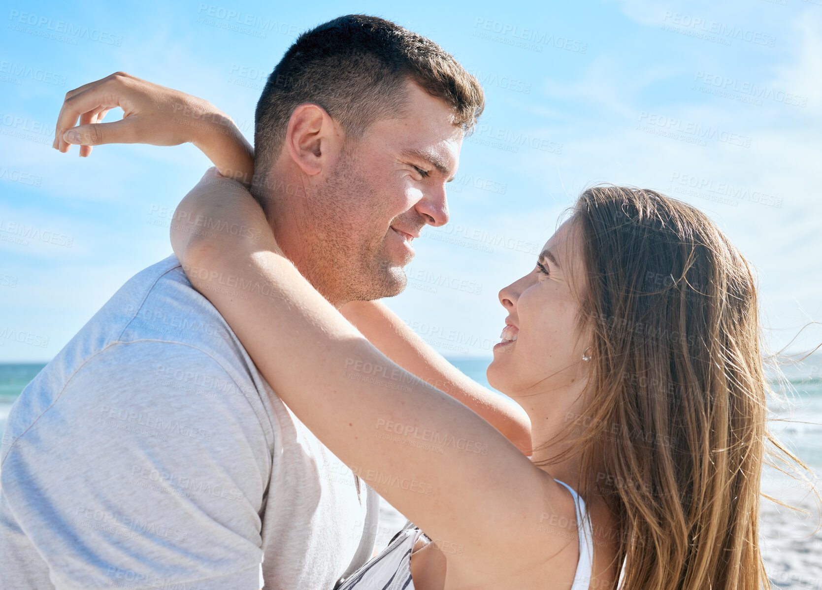 Buy stock photo Love, nature and couple hugging on beach, happy man and woman embrace at summer honeymoon destination. Travel, sea and happy couple relax and hug, spend time together on luxury vacation in Australia.