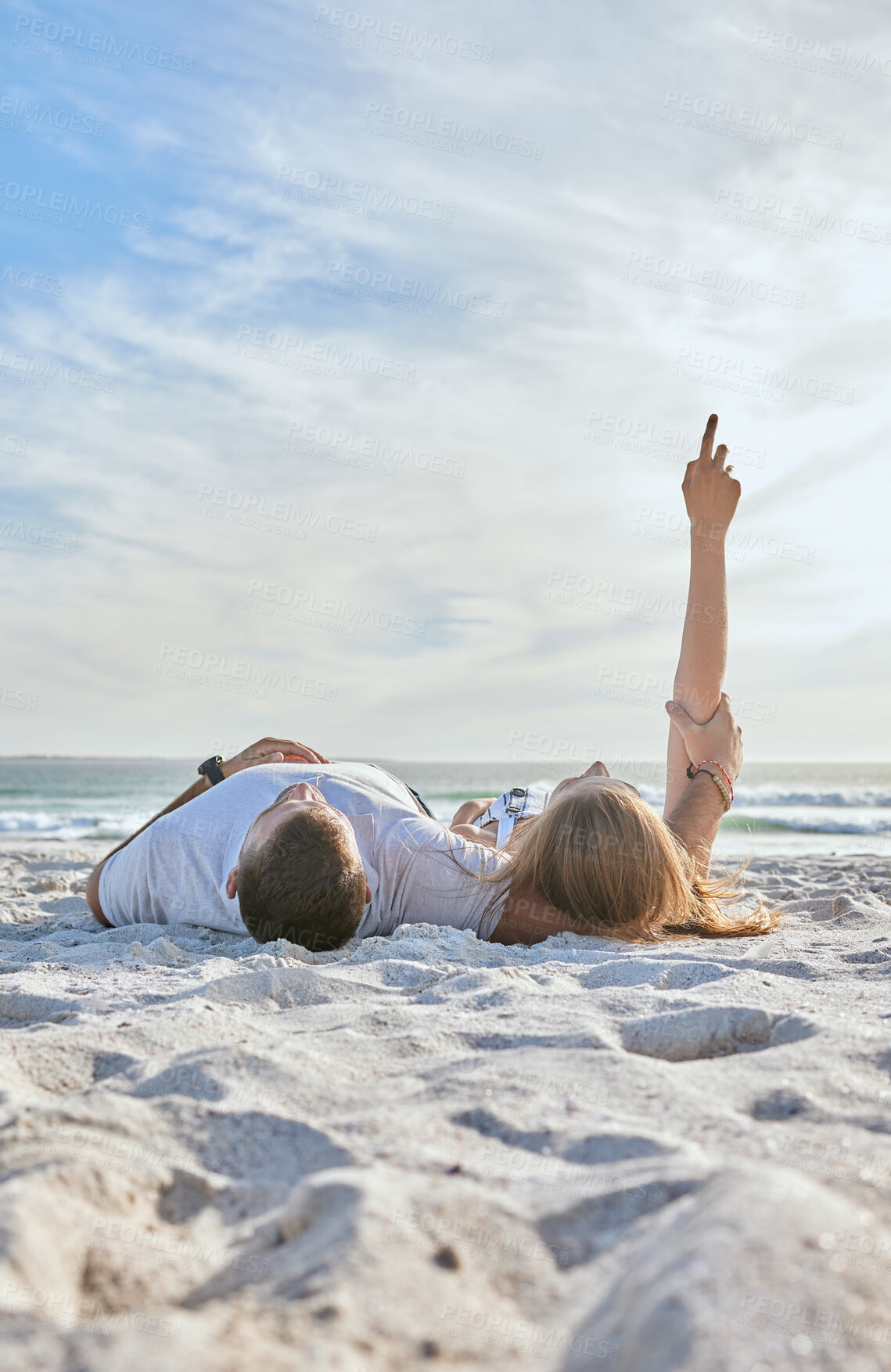 Buy stock photo Beach, relax and couple watching the sky while on a seaside vacation, adventure or journey. Travel, calm and man and woman resting together in nature by the ocean while on holiday in Australia.