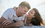 Couple, love and relax on beach sand in summer for romantic vacation break in Australia. Holiday, trust and happy people dating enjoy sunset together with laughter, smile and joy in nature.