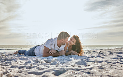 Buy stock photo Couple, love and sunset, beach while on a summer vacation to relax on sand together for travel, happiness and freedom outdoor. Man and woman in healthy marriage with trust and support by the sea