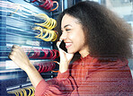 Server, engineer and phone call in data center with futuristic overlay for cloud computing, maintenance and big data. Tech, cyber security and smartphone communication of black woman in it career.