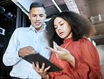 Tablet, woman and man check cyber security, connect server internet or coding information. IT specialist, female programmer and male coder talk with digital device for system admin or cloud computing