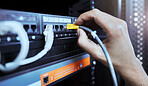 Hands, network engineer and server cable in server room for data, internet or web connection. Cyber security, system administrator and maintenance of computer wire to prevent error, glitch or issues