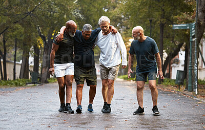 Buy stock photo Mature, friends and fitness pain with men helping friend after injury while training in nature for wellness and health. Exercise, workout and man with leg injury being helped by group working out