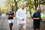 Run, group and senior men training, running and in street for health, wellness and fitness outdoor. Retirement, healthy males and friends running together, workout and exercise for cardio and strong.