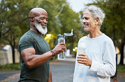 Buy stock photo Exercise, water bottle and senior men or friends together at a park for running, walking and fitness during retirement. Happy people in nature for a cardio workout and hydration while talking outdoor