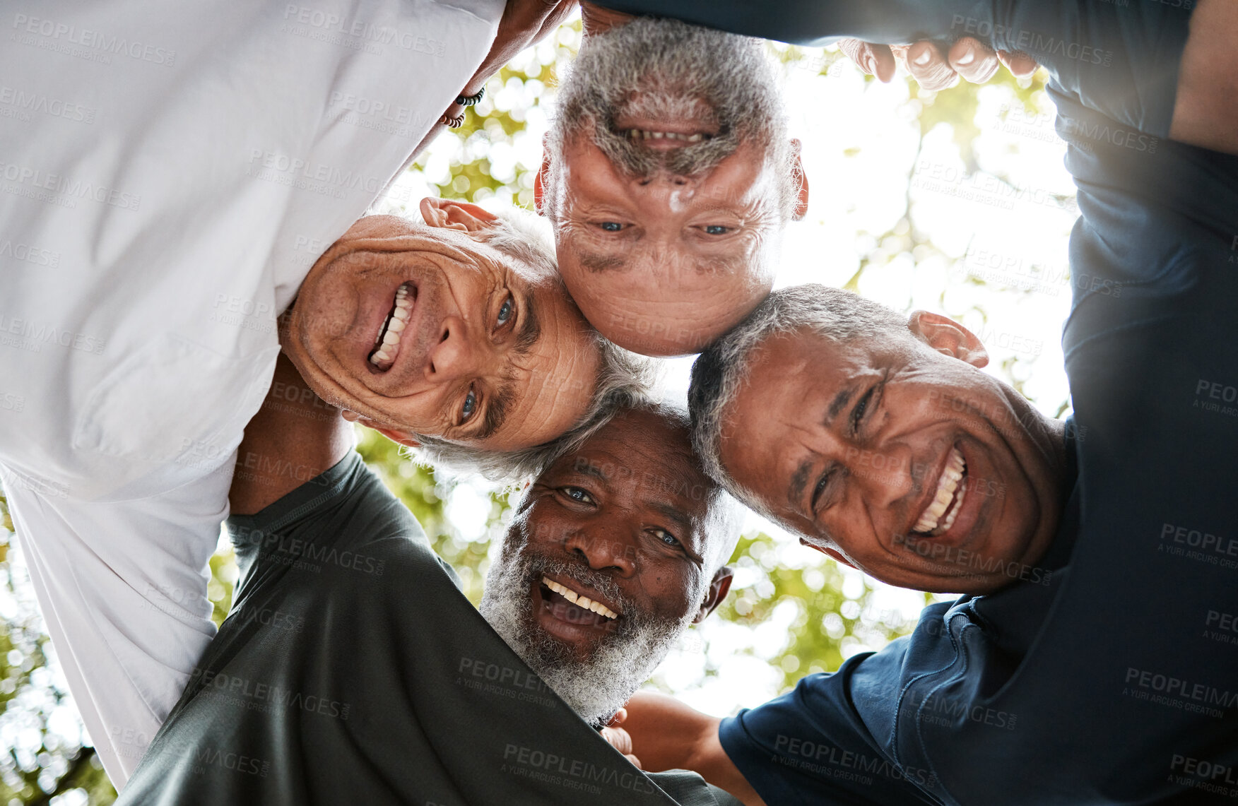 Buy stock photo Senior men, friends and community together in a circle for support, trust and diversity with a smile, happiness and collaboration. Portrait, face and hug of healthy, happy and fitness group outdoor