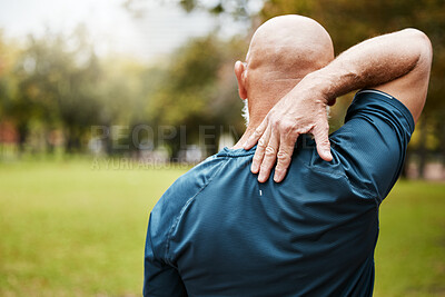 Buy stock photo Exercise, fitness and back pain of senior man at outdoor park after bad workout. Mature male runner with hand on spinal injury, fibromyalgia and muscle pain after cardio, running or training in nature