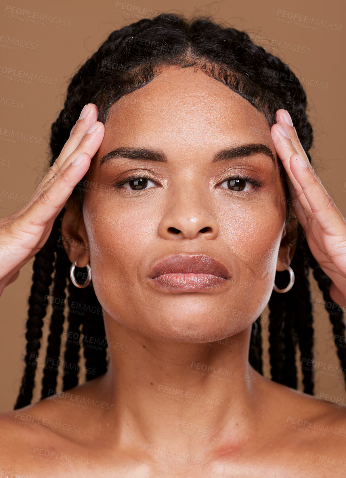 Buy stock photo Portrait, hair and black woman in studio for skincare, beauty and braids care against brown background. Face, skin and girl model serious about wellness, hygiene and grooming, natural hair and mockup