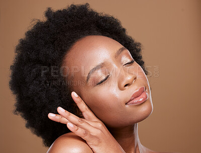 Buy stock photo Black woman, eyes close and beauty studio for skincare, cosmetics or wellness by brown backdrop. Radiant African model, glow or healthy skin for natural makeup, happy or cosmetic shine by background