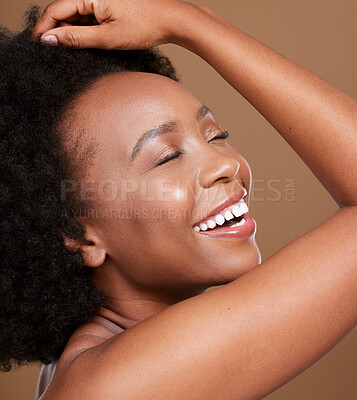 Buy stock photo Black woman, face and smile for skincare cosmetics, makeup of luxury treatment against brown studio background. African American female relax smiling in satisfaction for facial care and perfect skin