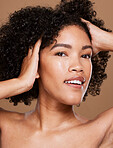 Beauty, skincare and curly hair with portrait of black woman for spa, luxury and natural stye. Cosmetics, makeup and smile with face of girl model for product, facial and salon in studio background