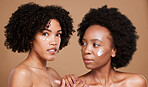 Black women, cream and skincare portrait, face and wellness product for beauty, cosmetics and studio brown background. Natural model, facial sunscreen or lotion for healthy skin, collagen and glow