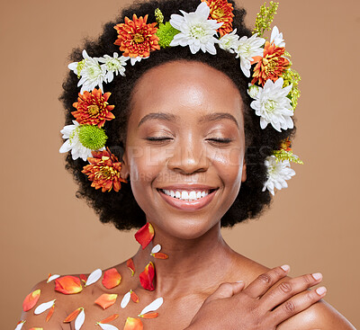 Hair flower, crown or beauty black woman with smile in brown studio background with glowing skin, facial skincare or wellness. Face, happy or wellness girl with flowers, rose or plants for spring