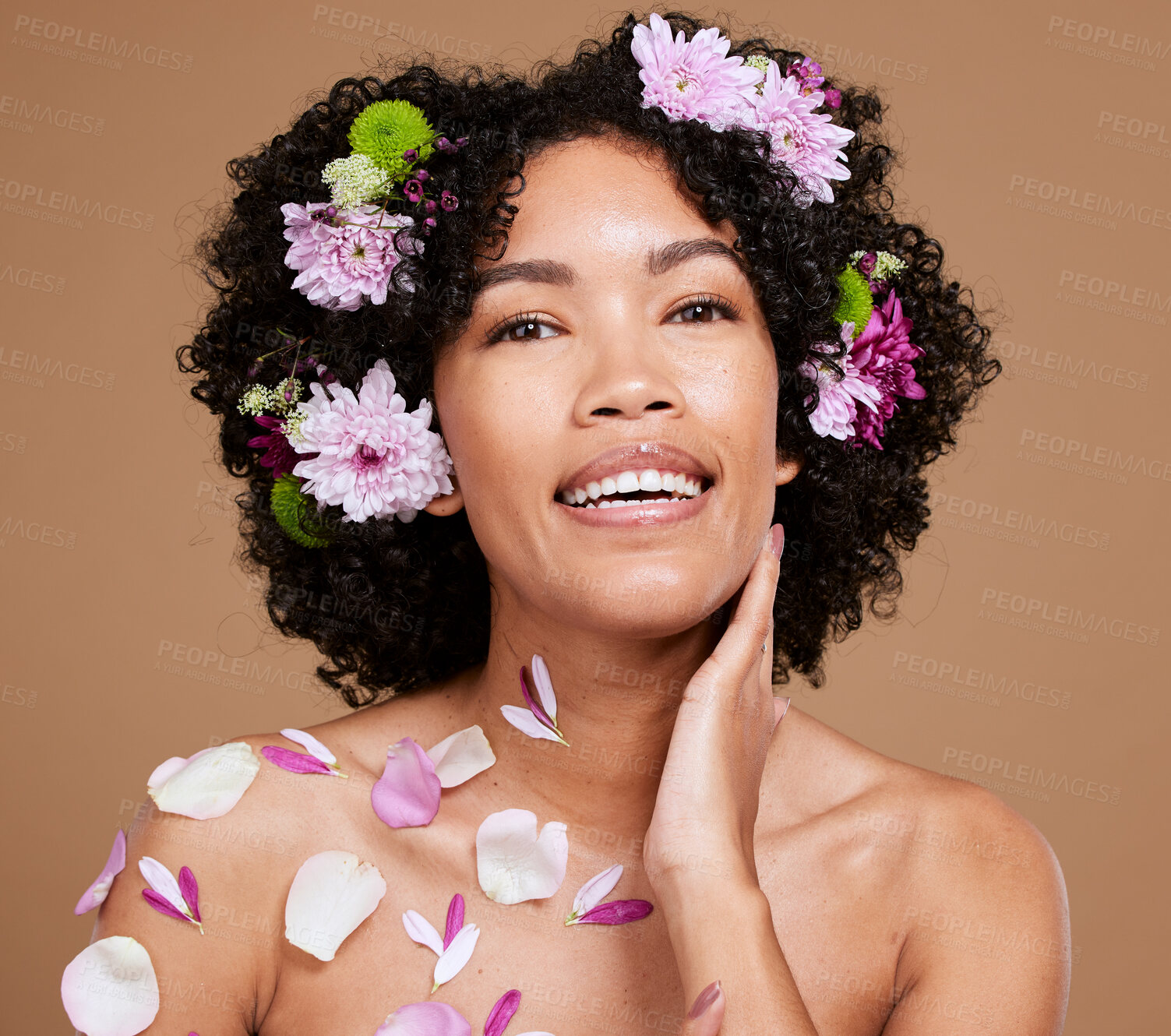 Buy stock photo Flower, beauty and natural skincare health with organic plant cosmetic product for skin wellness, floral hair care and eco friendly spa treatment. Portrait of happy model, natural smile and afro hair