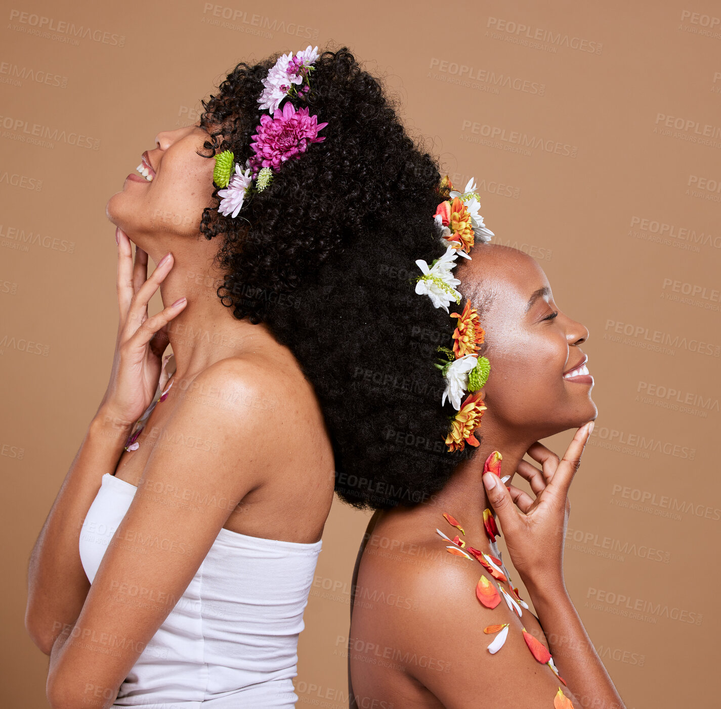 Buy stock photo Beauty, skincare and flowers in curly hair of black women for product, luxury and spring. Natural, creative and friends with girl model and art flower crown for self love, hair care and floral 