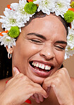 Flowers, wellness and black woman laughing with skincare, skin face glow and natural cosmetics. Happy young woman model with beauty dermatology, facial product and happiness with luxury treatment