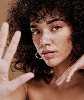 Buy stock photo Hand, portrait and woman in studio for skincare, beauty and wellness, sexy and attitude. Face, skin and girl model showing stop hand sign, saying no to ageing and satisfied with natural product