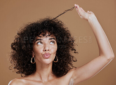 Buy stock photo Hair care, black woman and hairstyle health texture of a model holding afro to show salon results. Beauty, skincare and natural skin glow of a young woman think about cosmetic wellness and hair style