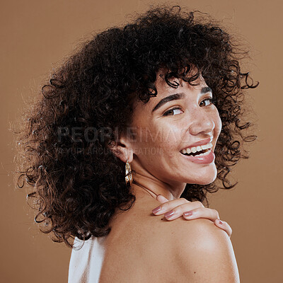 Buy stock photo Woman, hair care and skincare for beauty, happy and face makeup, natural cosmetics and smile on brown studio background. Portrait, model and facial foundation, self love and pride of healthy skin