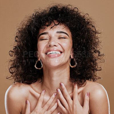 Buy stock photo Beauty, skincare and self love of a black woman with natural hair feeling happiness and pride for identity on a brown studio background. Aesthetic model happt about cosmetics, makeup and glow on skin