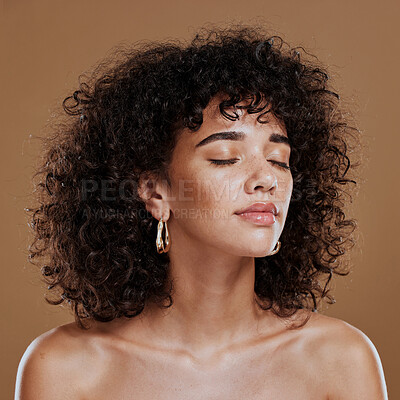 Buy stock photo Woman, beauty and freckles, curly hair and facial treatment, makeup and body care aesthetics, shine or glow on studio background. Young model, melasma face and natural cosmetics, skincare or wellness