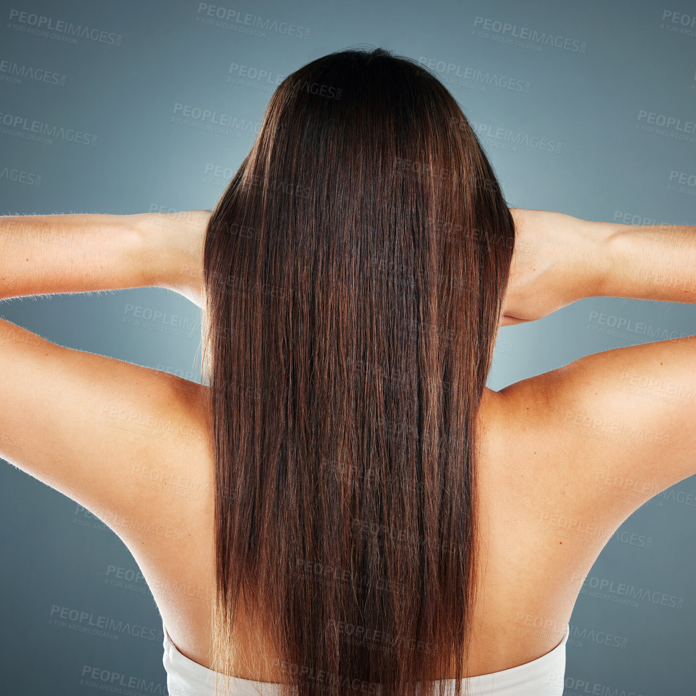 Buy stock photo Beauty, salon and wellness model with straight hair texture from smooth, healthy and brazilian keratin shampoo. Cosmetic, shine and beautiful hair care woman in gray studio with back view.

