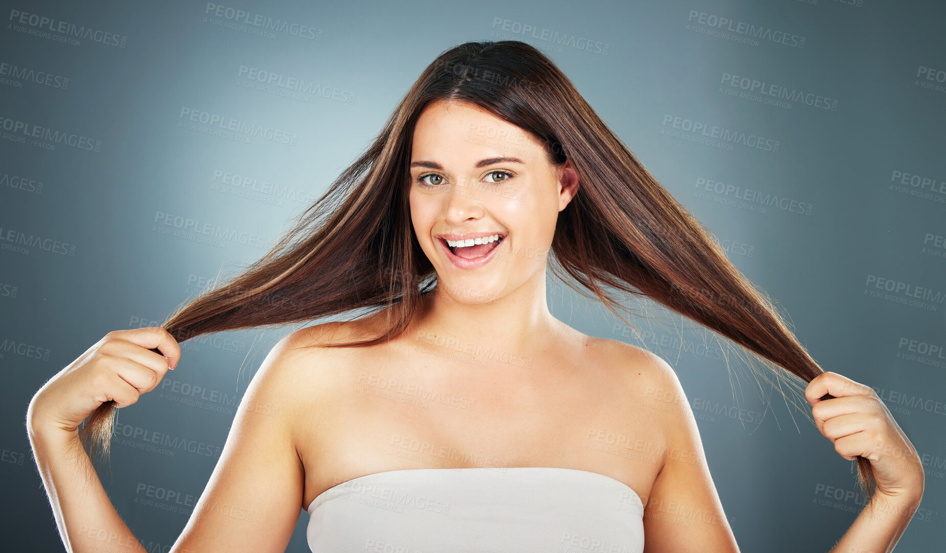 Buy stock photo Hair care, beauty and woman with hair in hands for growth on gray background studio. Hair salon, spa and portrait of girl with long, healthy and natural style after treatment, products and cosmetics