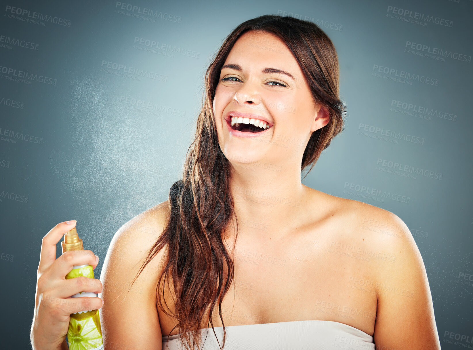 Buy stock photo  Woman, spray and hair care beauty for shine, healthy and glow texture in care bottle. Smile portrait, happy and oil cosmetic protection product with confident girl model in dark studio background