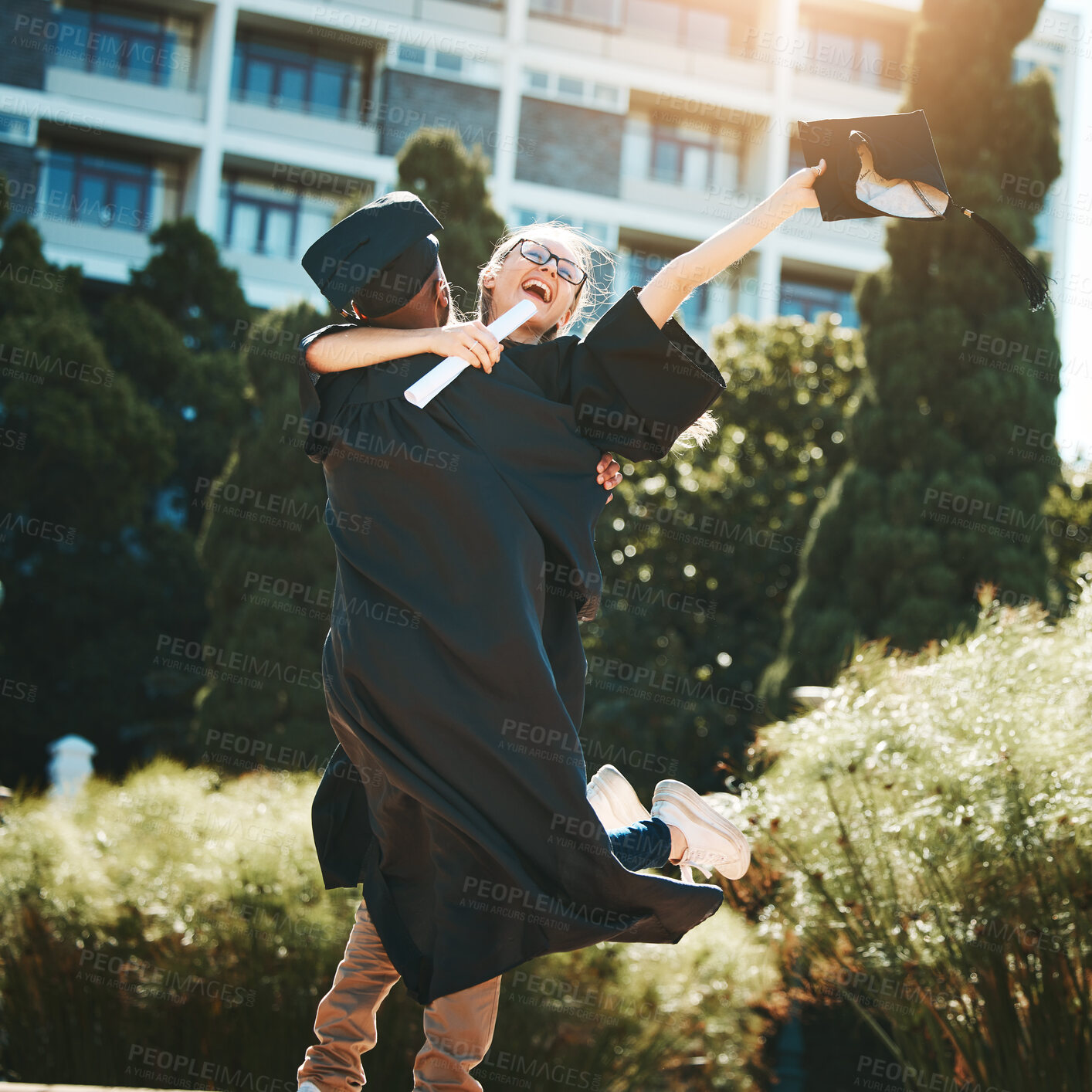 Buy stock photo Education, college graduation and celebration for university achievement, friends hug for congratulations on campus. Man and woman scholarship students or graduate happy about diploma or certificate