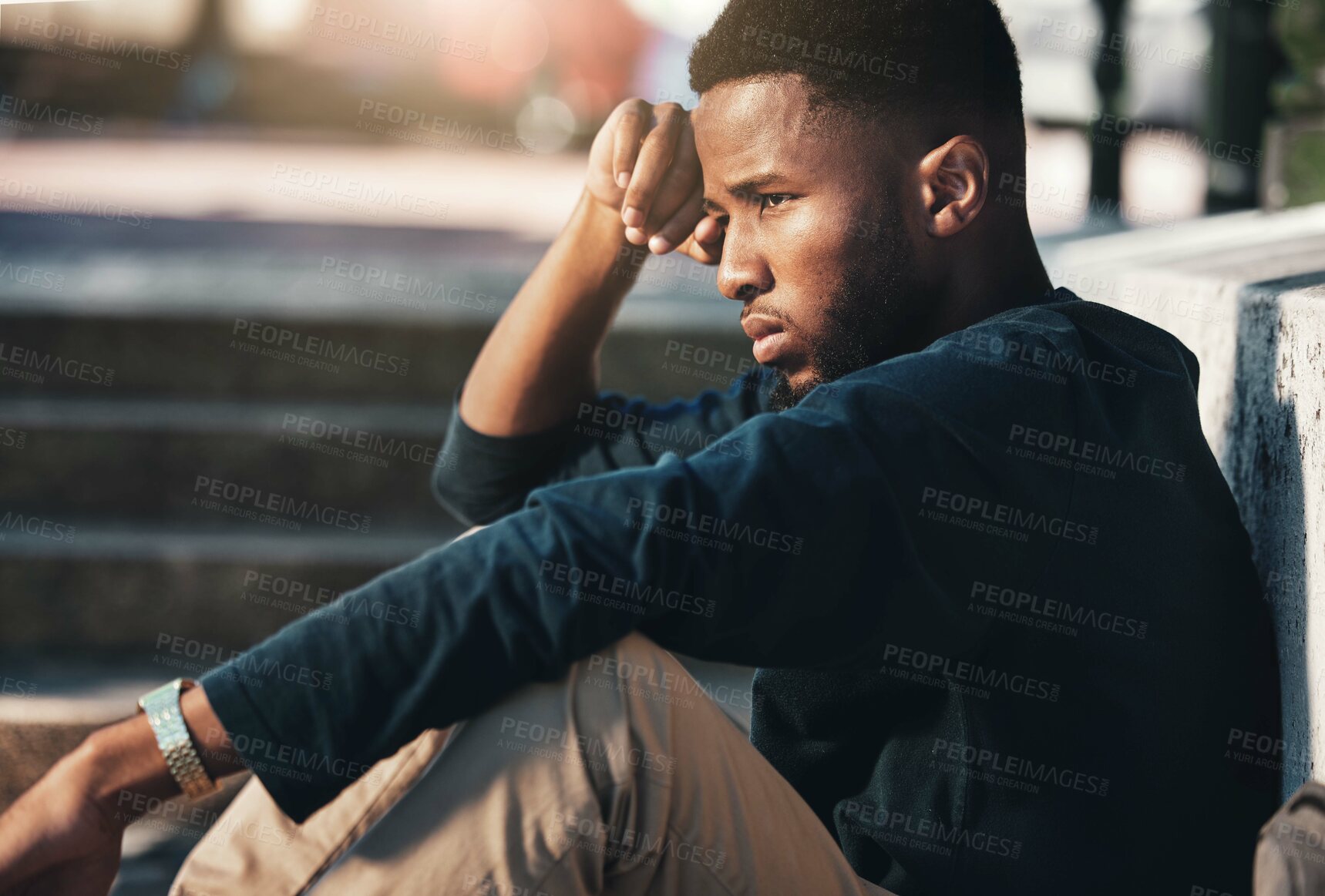 Buy stock photo Depressed, angry and black man upset, tired and unhappy outdoor in city, stare and frustrated. Mental health, African American male and young guy with problem, fail and depression being disappointed.