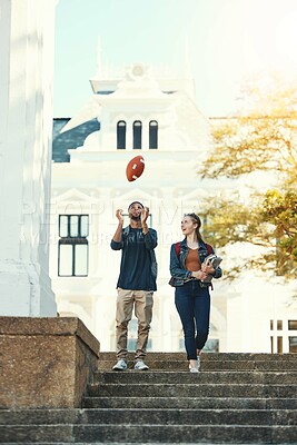 Buy stock photo Students, walking and talking on education, study and happy on college or university campus outdoor. Black man and woman with ball, conversation and carry textbook after class or lecture at school