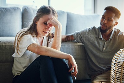 Buy stock photo Stress, divorce and couple in living room after a fight, argument or conflict in the marriage at home. Sad, depression or woman with a worried and tired partner cheating thinking of breakup in house