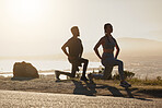 Fitness, beach and couple doing a lunge exercise for health, wellness and training in nature. Motivation, sports and healthy man and woman athletes doing an outdoor workout by the ocean or sea.