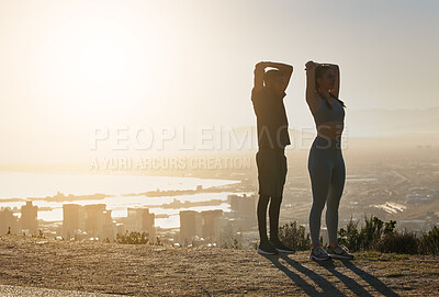 Buy stock photo Fitness, silhouette and couple stretching in city in morning for motivation, inspiration and wellness. Sports, exercise and man and woman training, workout and stretch at sunrise with city background