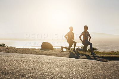 Buy stock photo Man, woman or fitness stretching at sunset for exercise, training or workout for heart health, cardio or muscle growth. Runners, sports team or athletes in wellness warm up on remote mountain sunrise