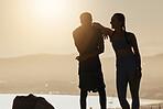 Fitness, silhouette and couple talking in nature on break after workout outdoors. Sunset, happy man and woman discussing goals, training or target together after running or exercising for wellness.